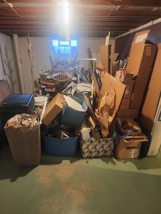 Roll-off dumpster container at job site for 6 Yard Dumpster Rental in Batesville